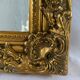 Miroir biseauté style empire doré 74x64cm