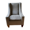 Fauteuil gris clair réalisé par un artisan