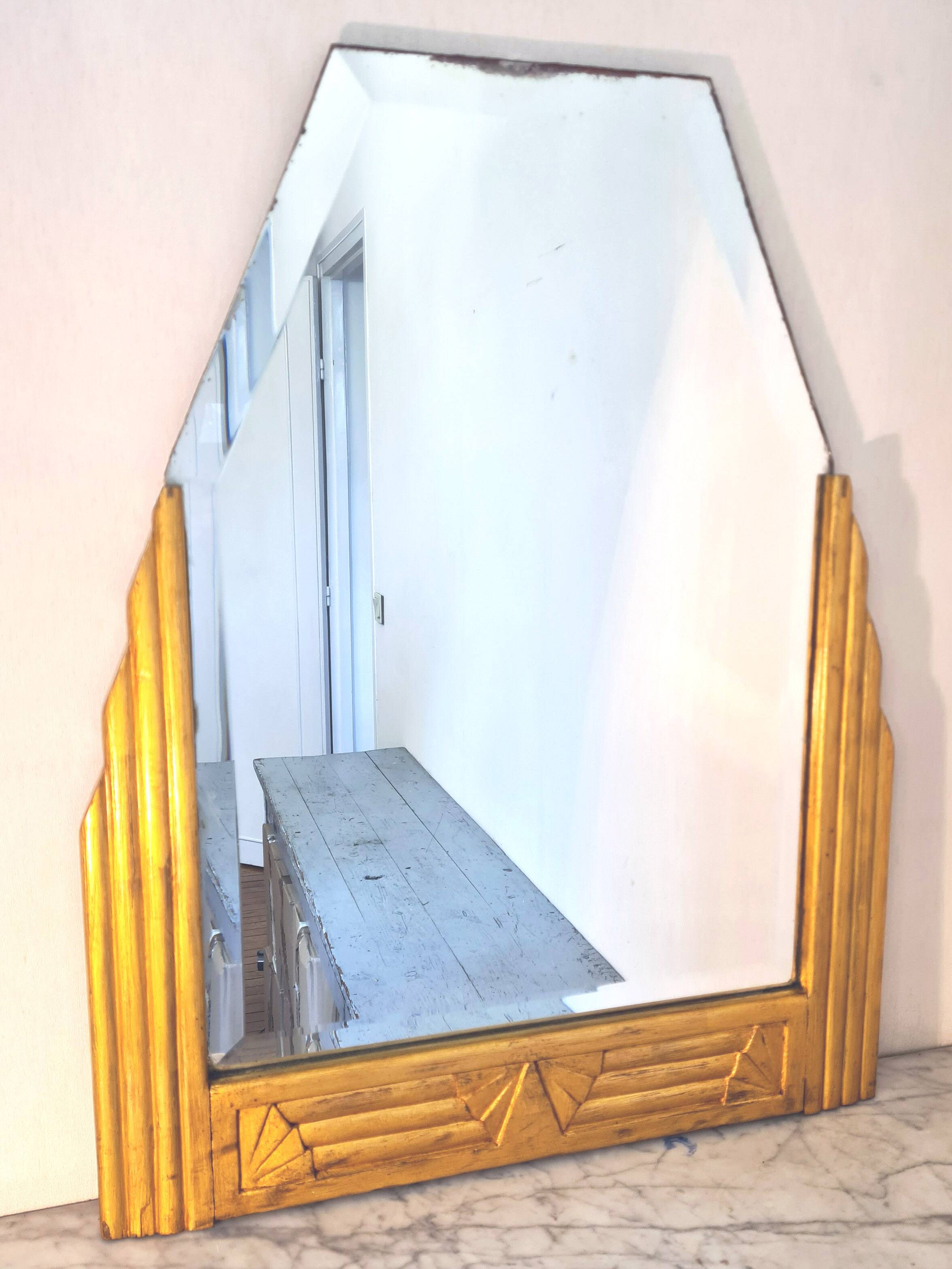 Antique Art Deco mercury mirror, in carved wood with gold leaf.
