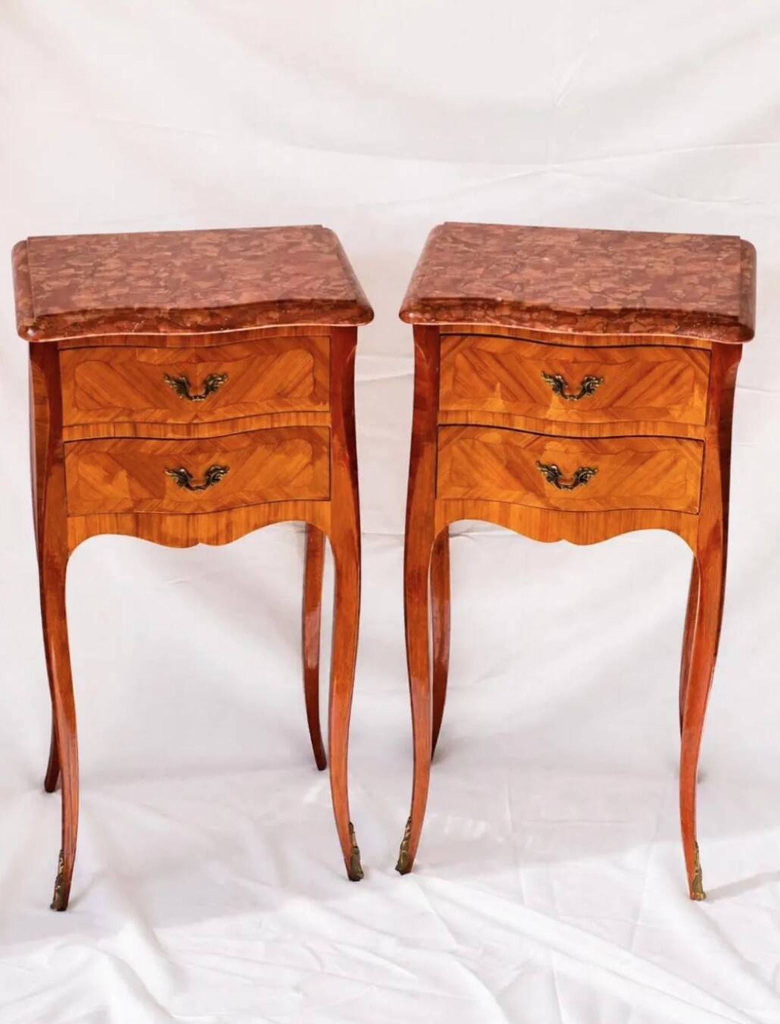 Pair of French rosewood bedside tables, marble top, inlaid beds.