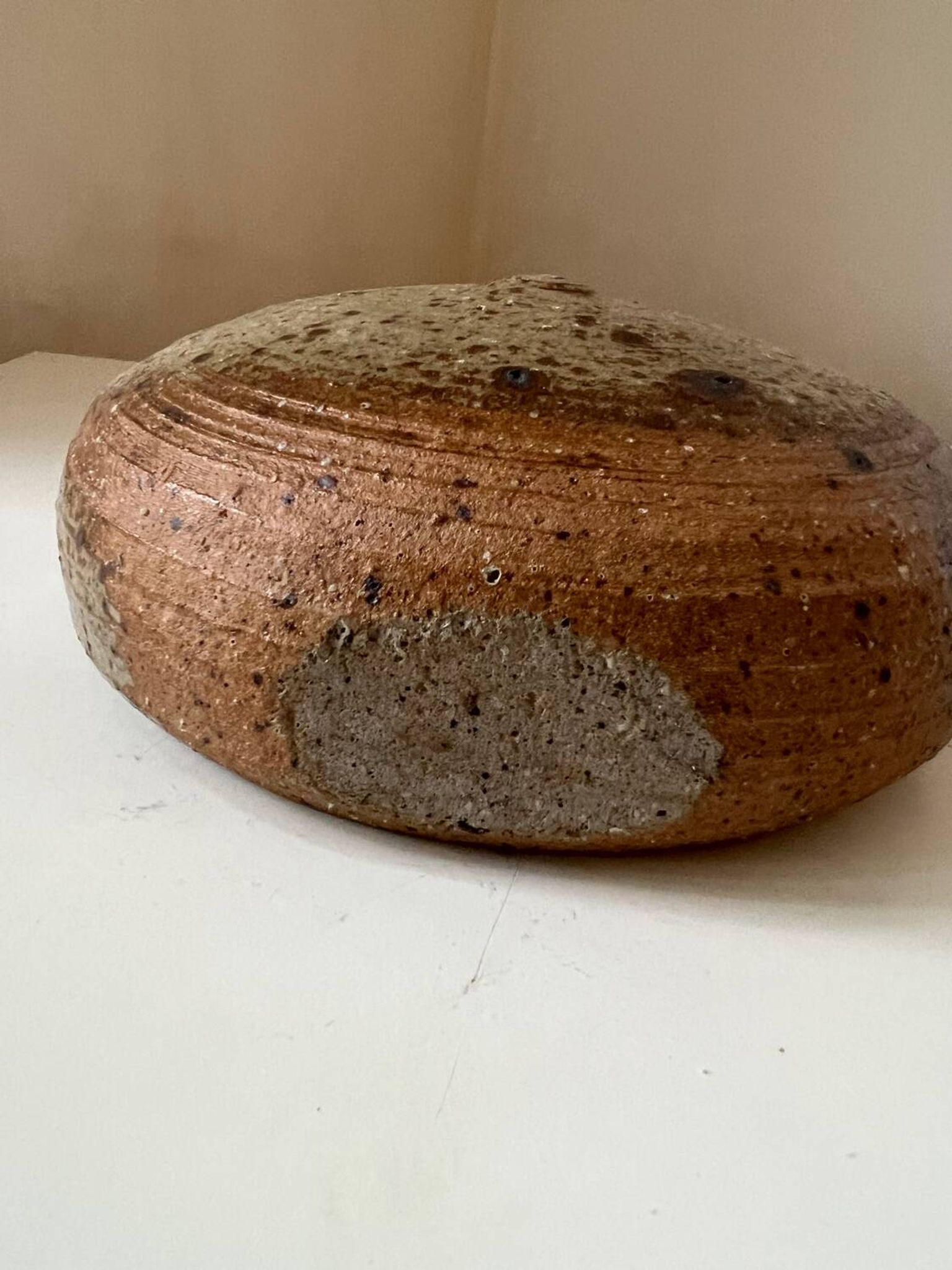 Vintage round, flat-bottomed stoneware bud vase