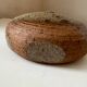 Vintage round, flat-bottomed stoneware bud vase
