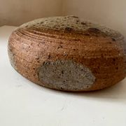 Vintage round, flat-bottomed stoneware bud vase