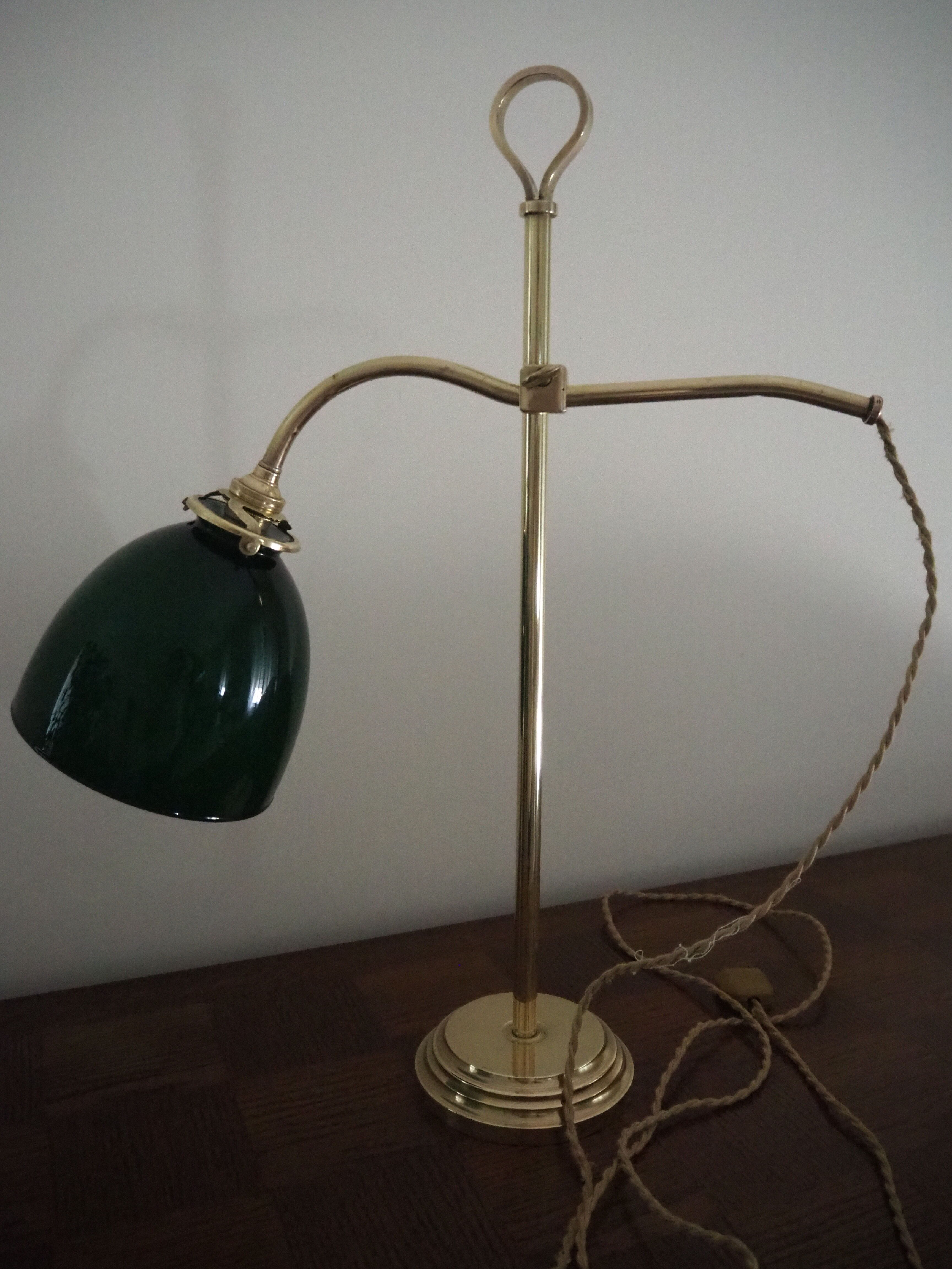 Desk lamp in brass with a swan neck and green opaline glass.