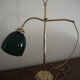 Desk lamp in brass with a swan neck and green opaline glass.