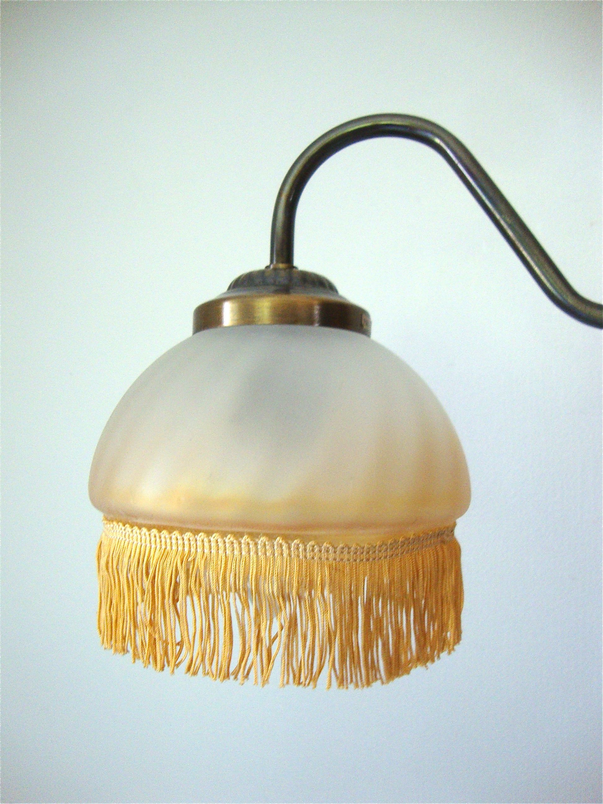 Fringed sconce