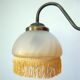 Fringed sconce
