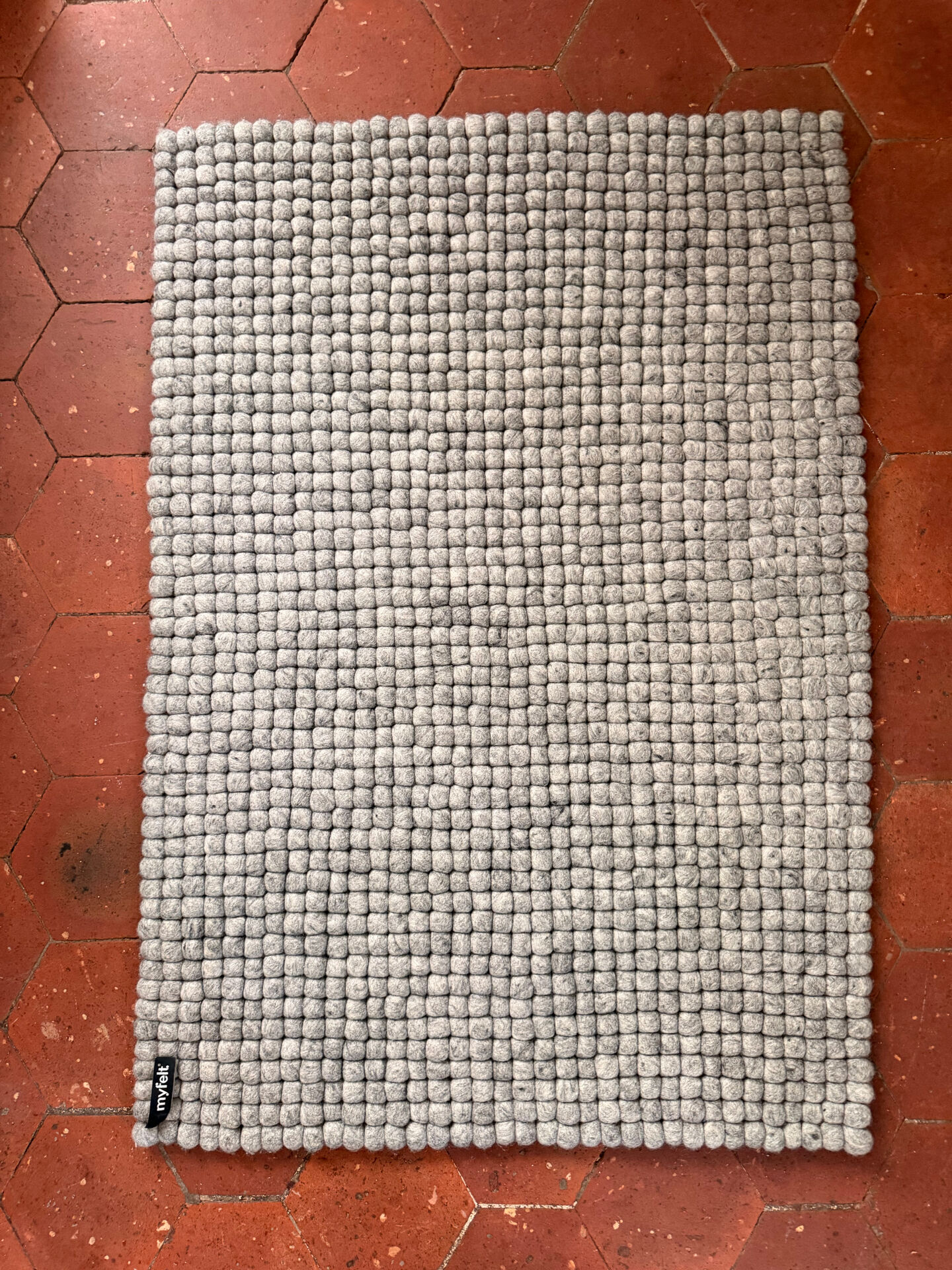Myfelt rug made of virgin wool felt balls.