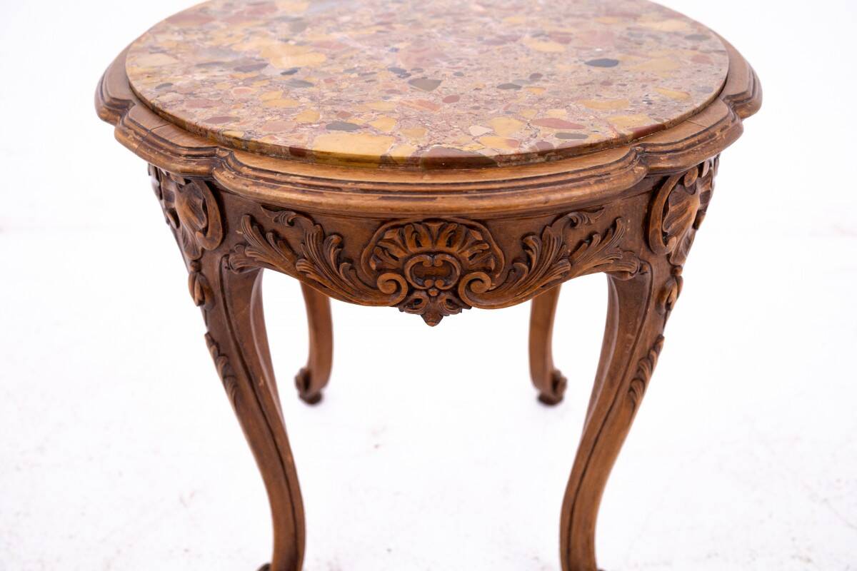 Table with a marble top, France, circa 1870.