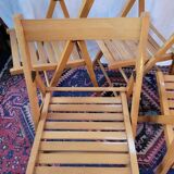 Set of 4 folding chairs in varnished wood