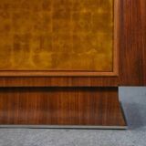 Art Deco rosewood sideboard with gilt door, attributed to Maison Dominique, 1940s