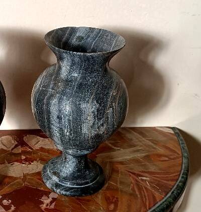 Pair of black serpentine marble vase-urns, early 20th century, Empire style