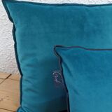Set of 2 turquoise blue velvet cushions with black overlock finish