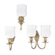 Three brass and opaque glass wall lights, 1950s.