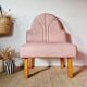 Single bar stool in pink stitched faux leather.