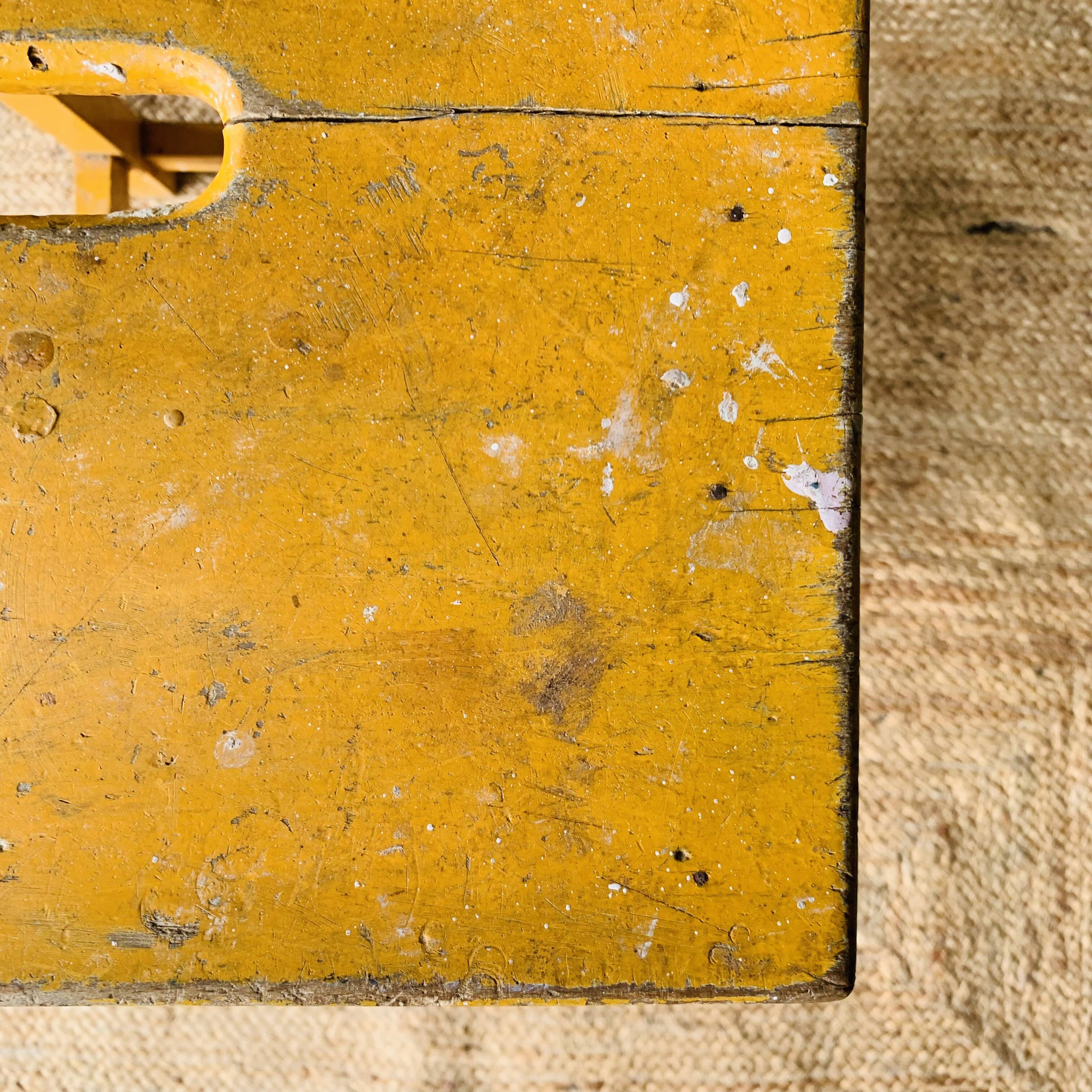 Yellow wooden high stool