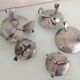 Suite of five candlesticks in brushed metal / vintage 60s-70s