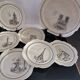 Series of 12 dessert plates and its cake tray Gien Paris Monuments