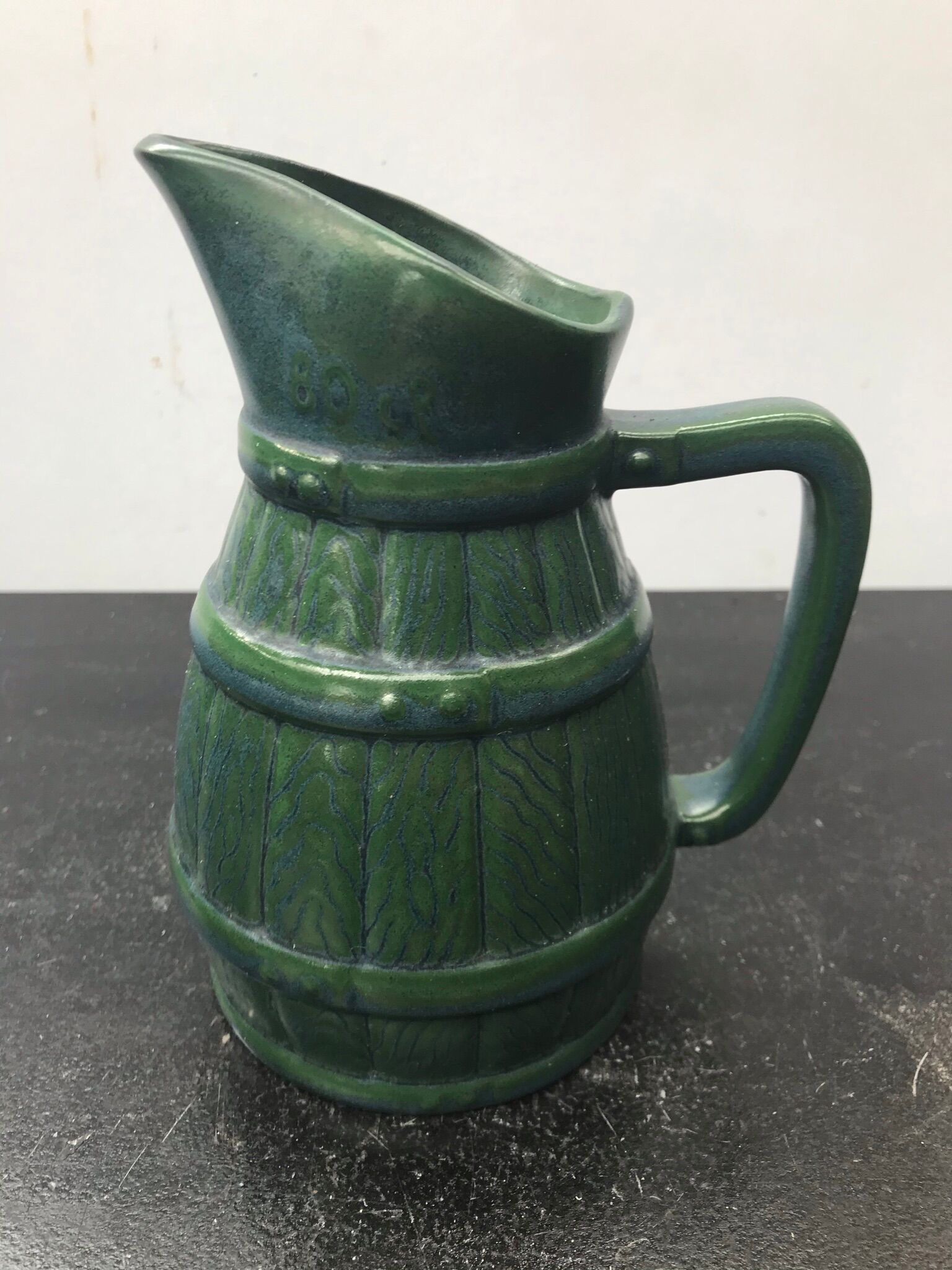 Former green ceramic pitcher shape tonneau