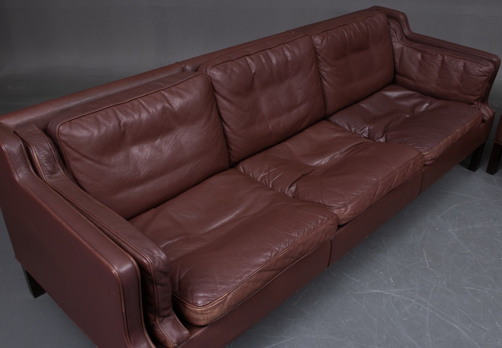 Three-seater leather sofa and one-seater armchair, scandinavian style