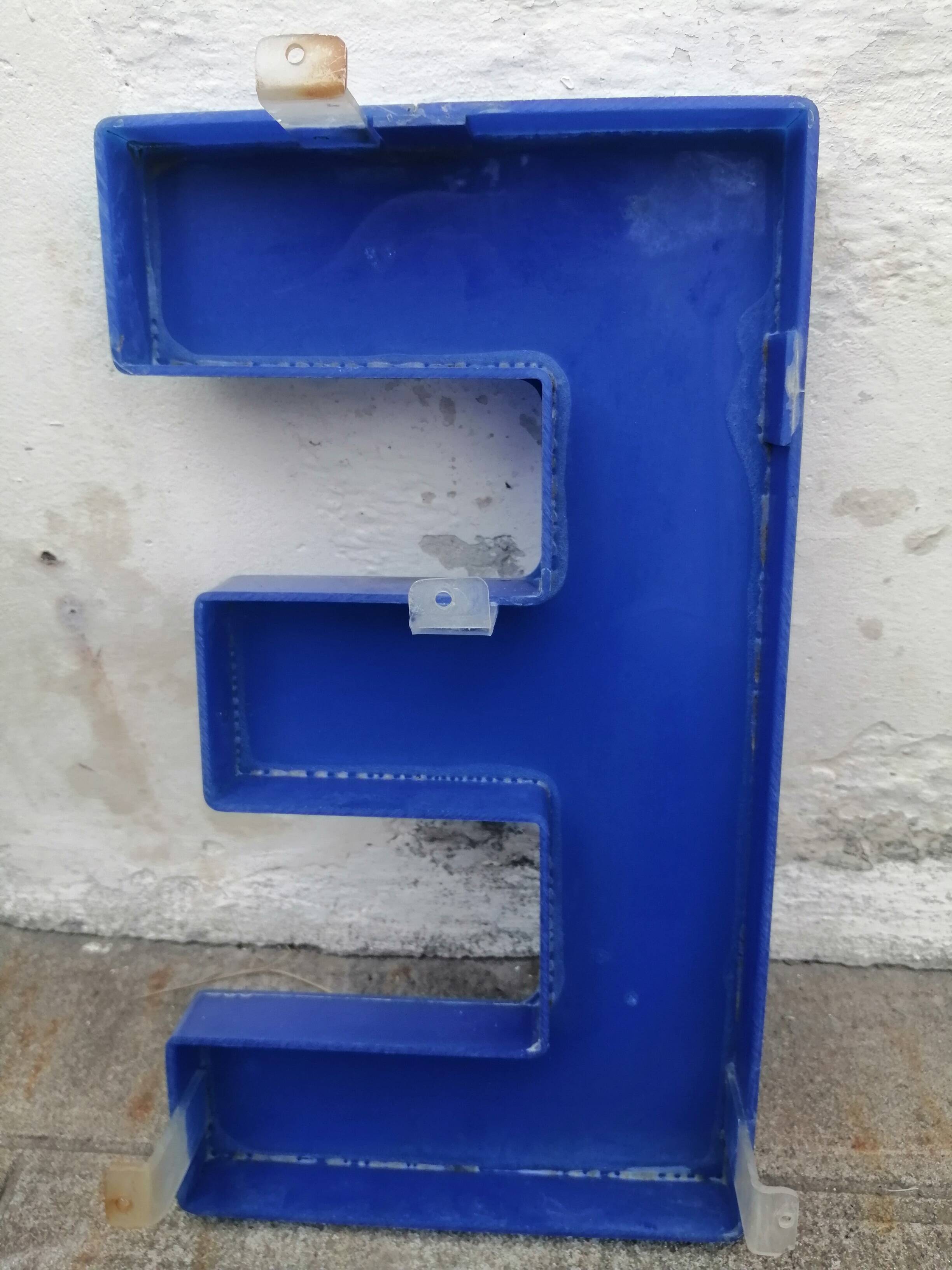 Plexiglas sign letter E