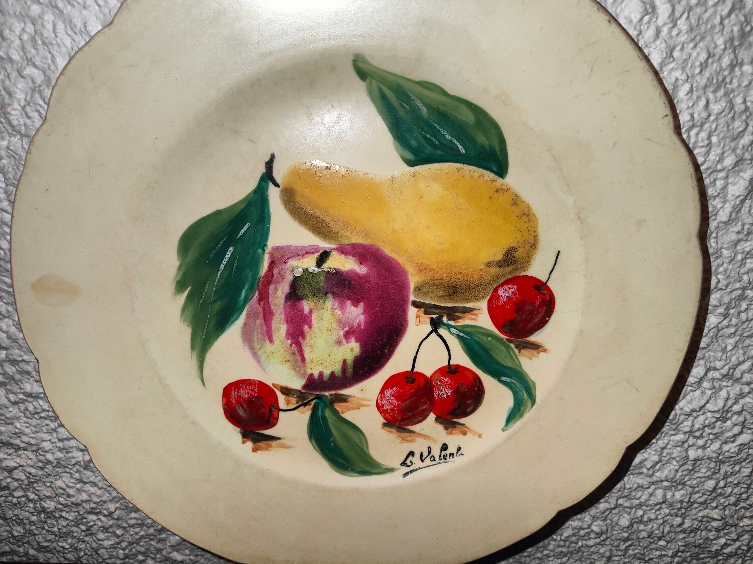 Faience plate in Longwy enamels signed Léa Valentin Les Fruits