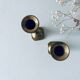 Paire de bougeoirs indiens en laiton