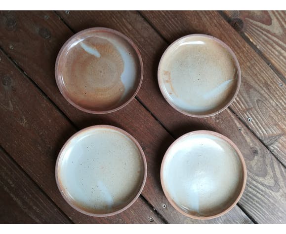 Lot of 4 deep plates made of vintage sandstone