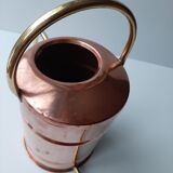 Ancient copper watering can