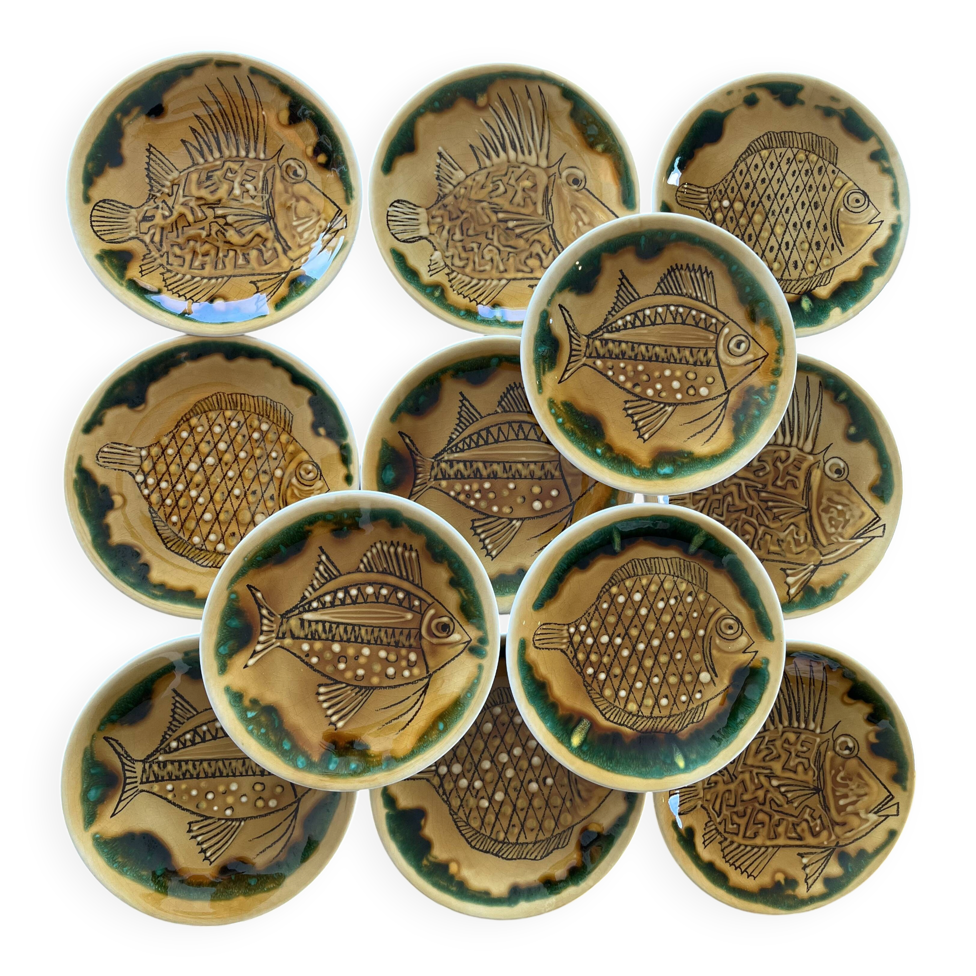 Ensemble de 12 assiettes de la série "Poisson" de Longchamp