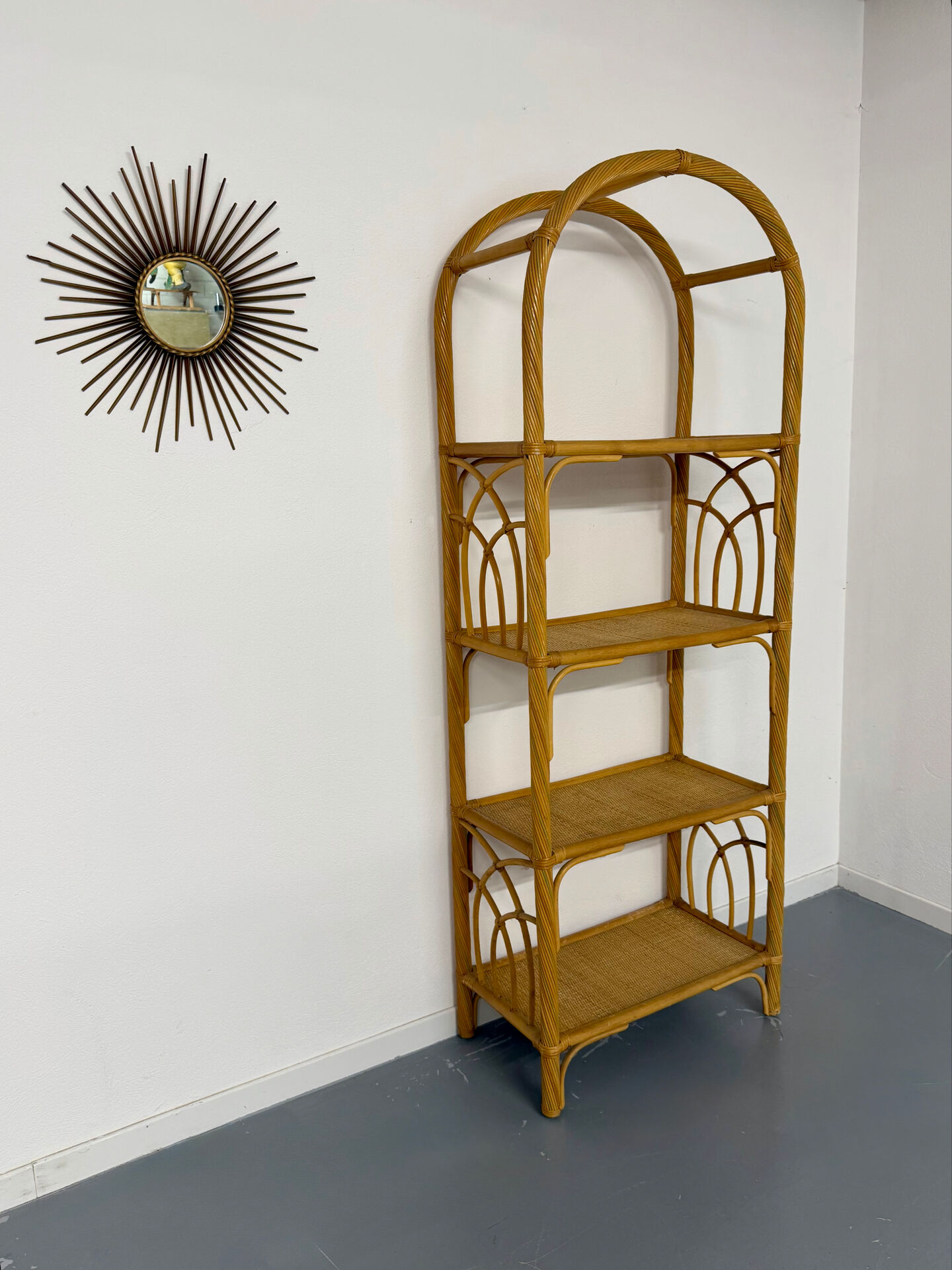 Large woven rattan bookshelf designed in the 1970s.