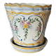 Earthenware cachepot, hand-decorated with floral motifs and scrolls