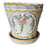 Earthenware cachepot, hand-decorated with floral motifs and scrolls
