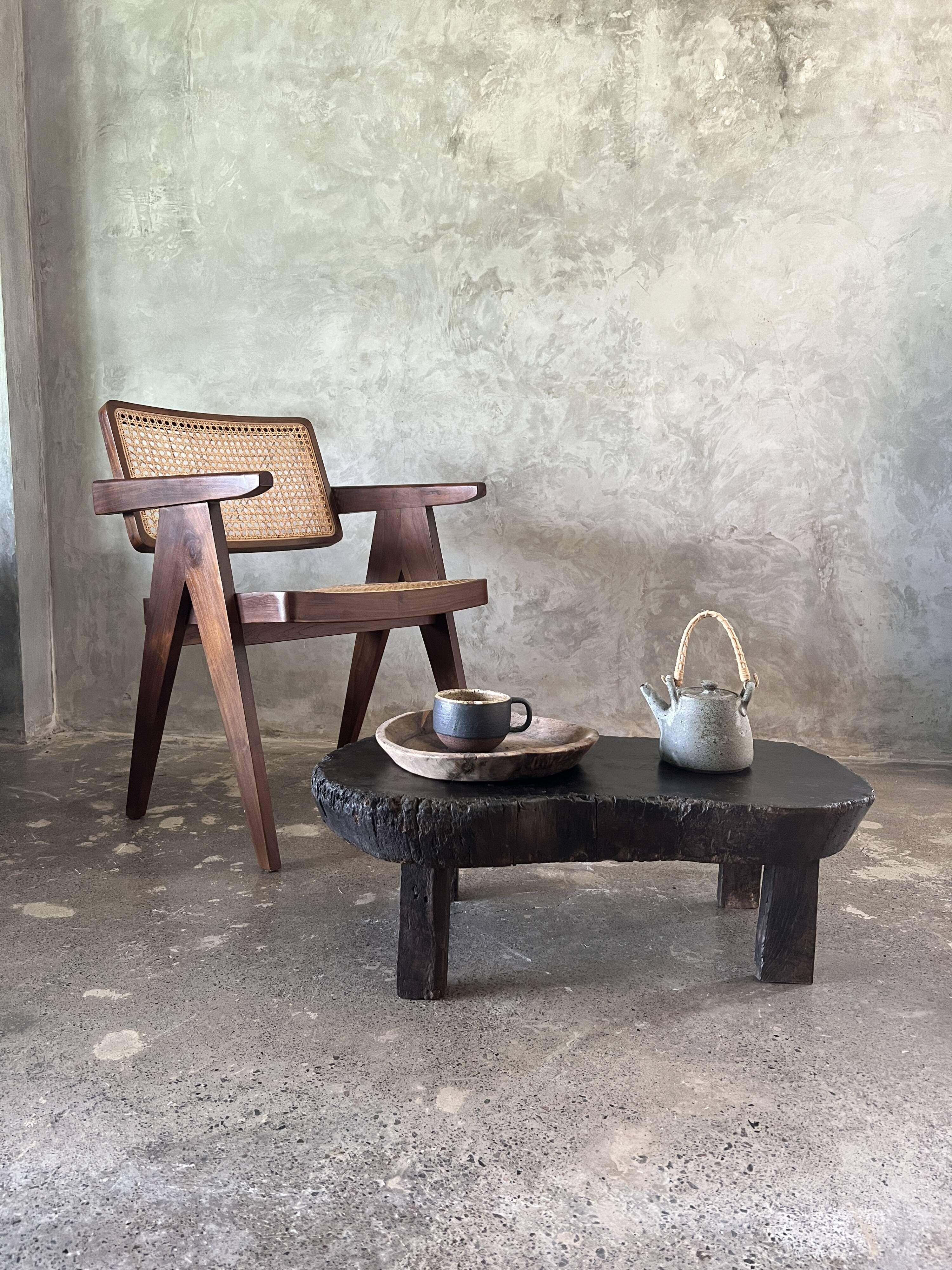 Small old Asian wooden coffee table in Japanese style, kidney-shaped top