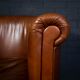 Chaise club en cuir de mouton