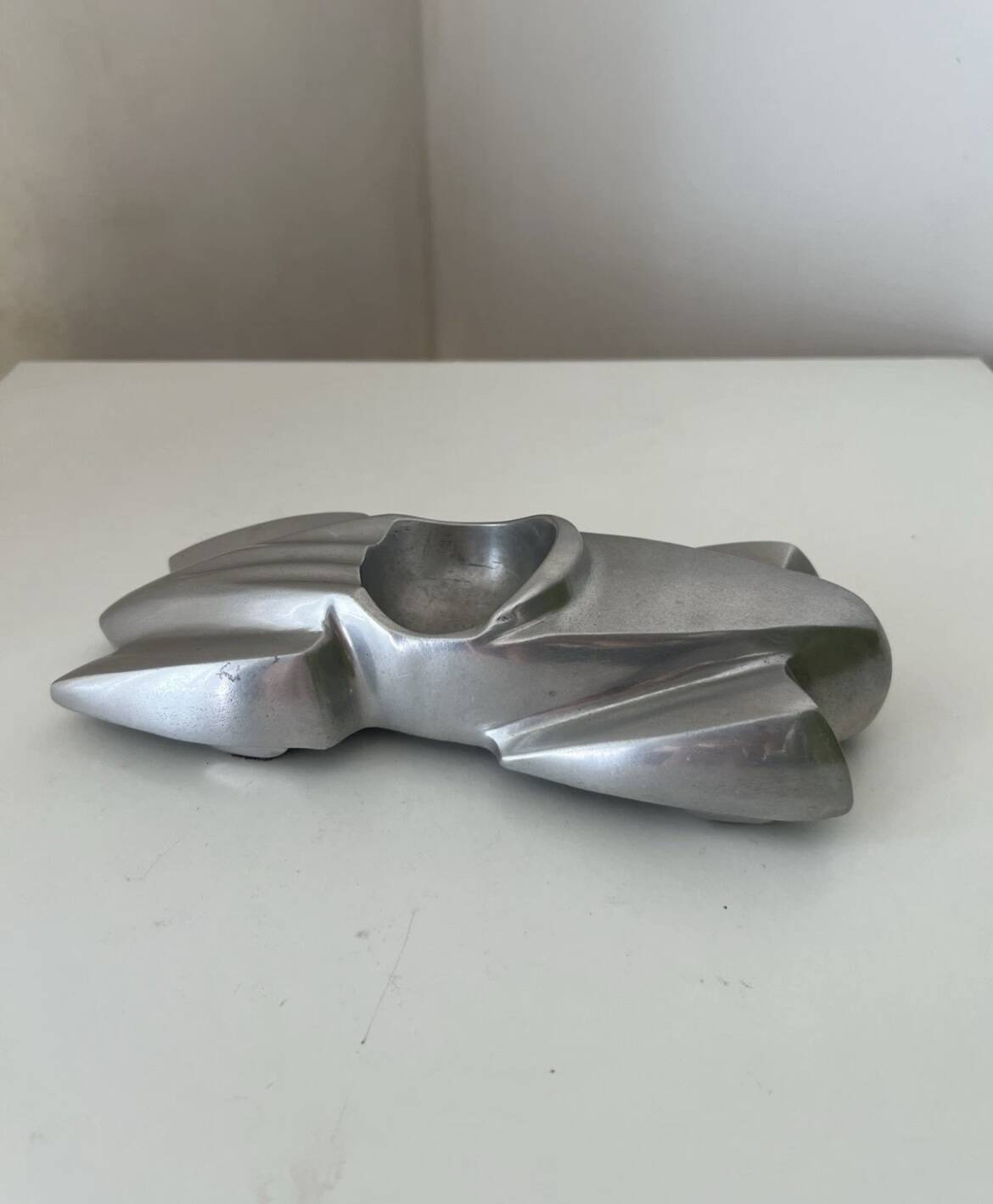 Antique Art Deco Mercedes aluminum car ashtray?