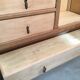 Raw wood hotel cabinet