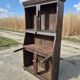 antique cabinet with carvings and wrought iron fittings rural