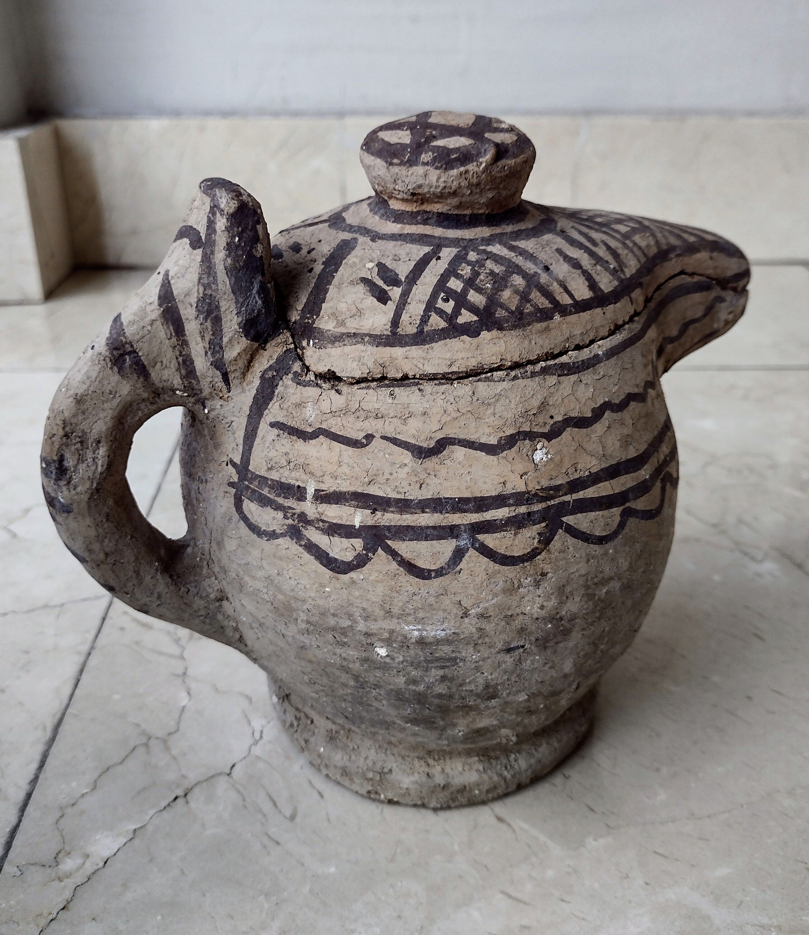Berber earthenwear milk jug