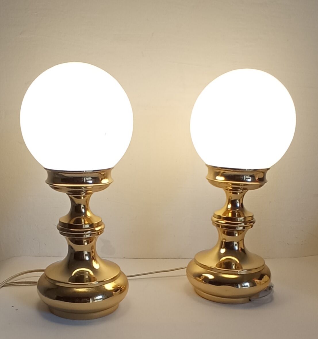 Pair of gilded metal lamps