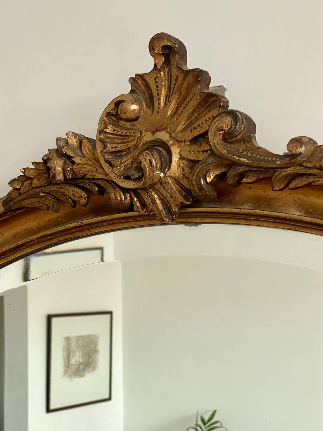 Antique oval gilt mirror.