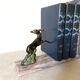 Art deco bookends in pink marble and spelters, antelopes