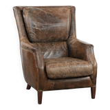 Very comfortable vintage cow leather armchair with character