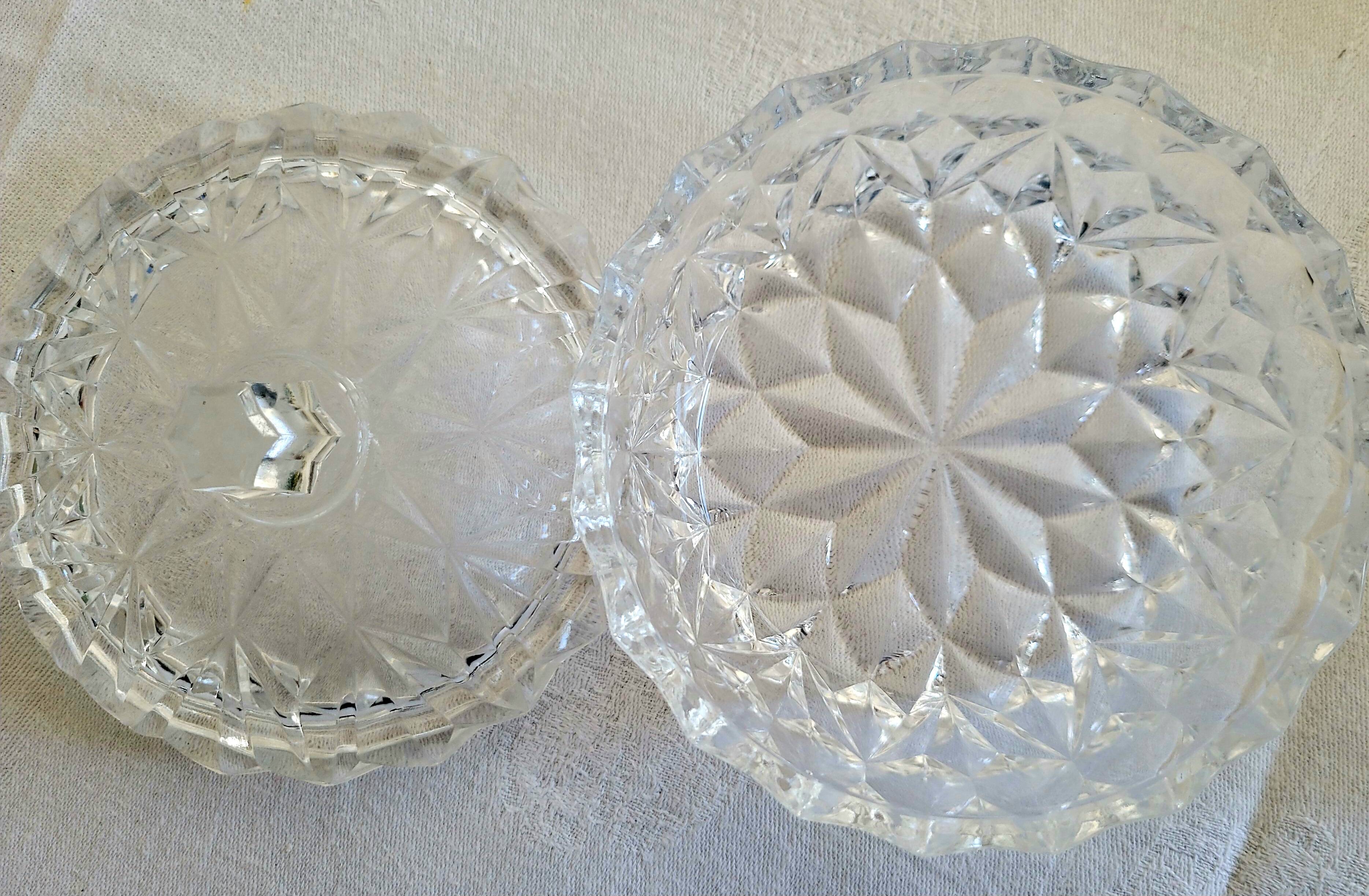 Glass sugar bowl with its tongs