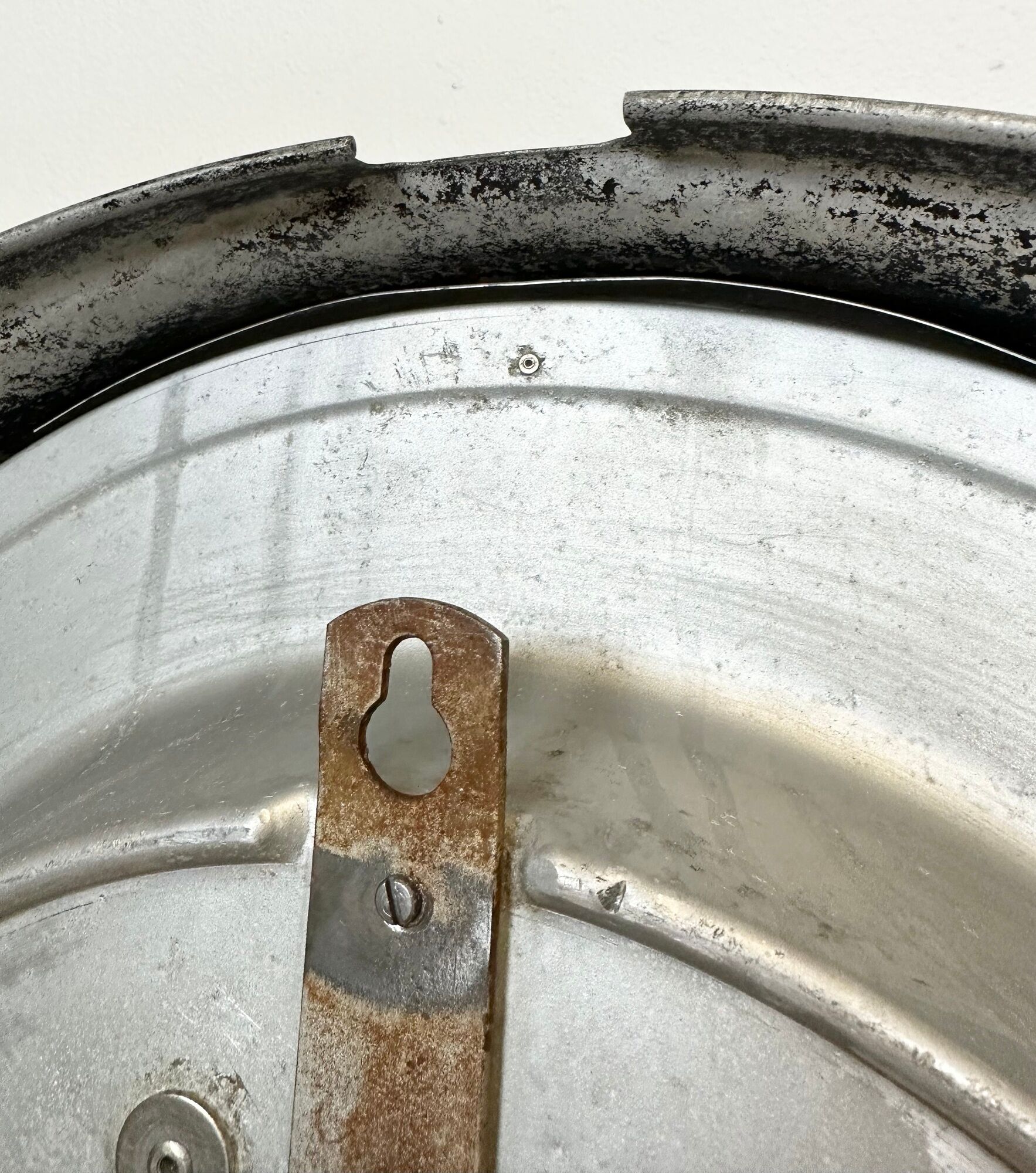 Black swiss industrial wall clock from inducta, 1960s