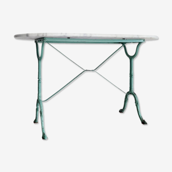 White marble bistro table with oval top