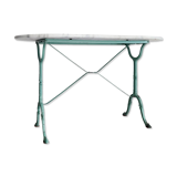 White marble bistro table with oval top