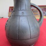 Small pewter pitcher, signed “Cortési”