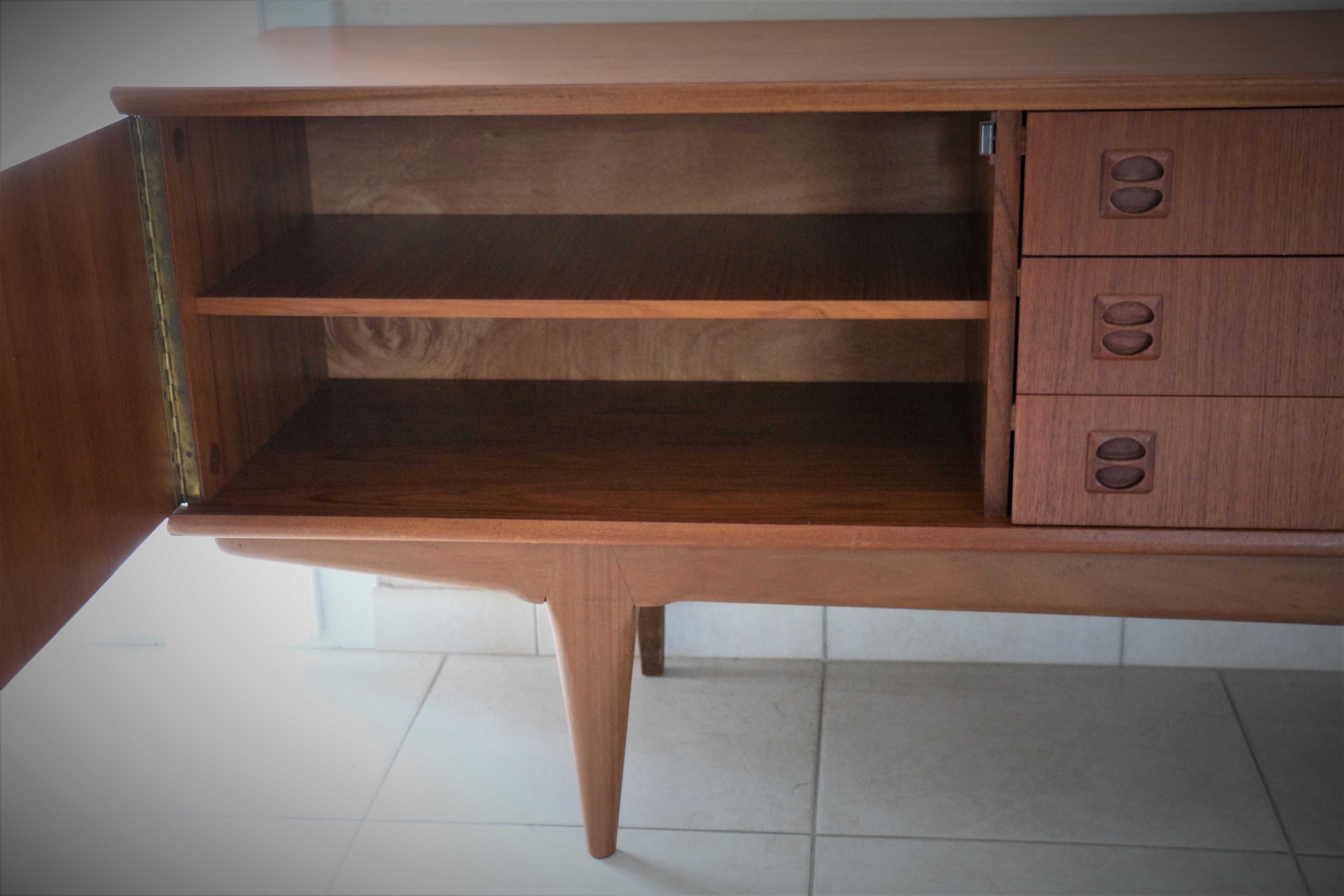 Scandinavian sideboard in teak and teak veneer in the late 60s