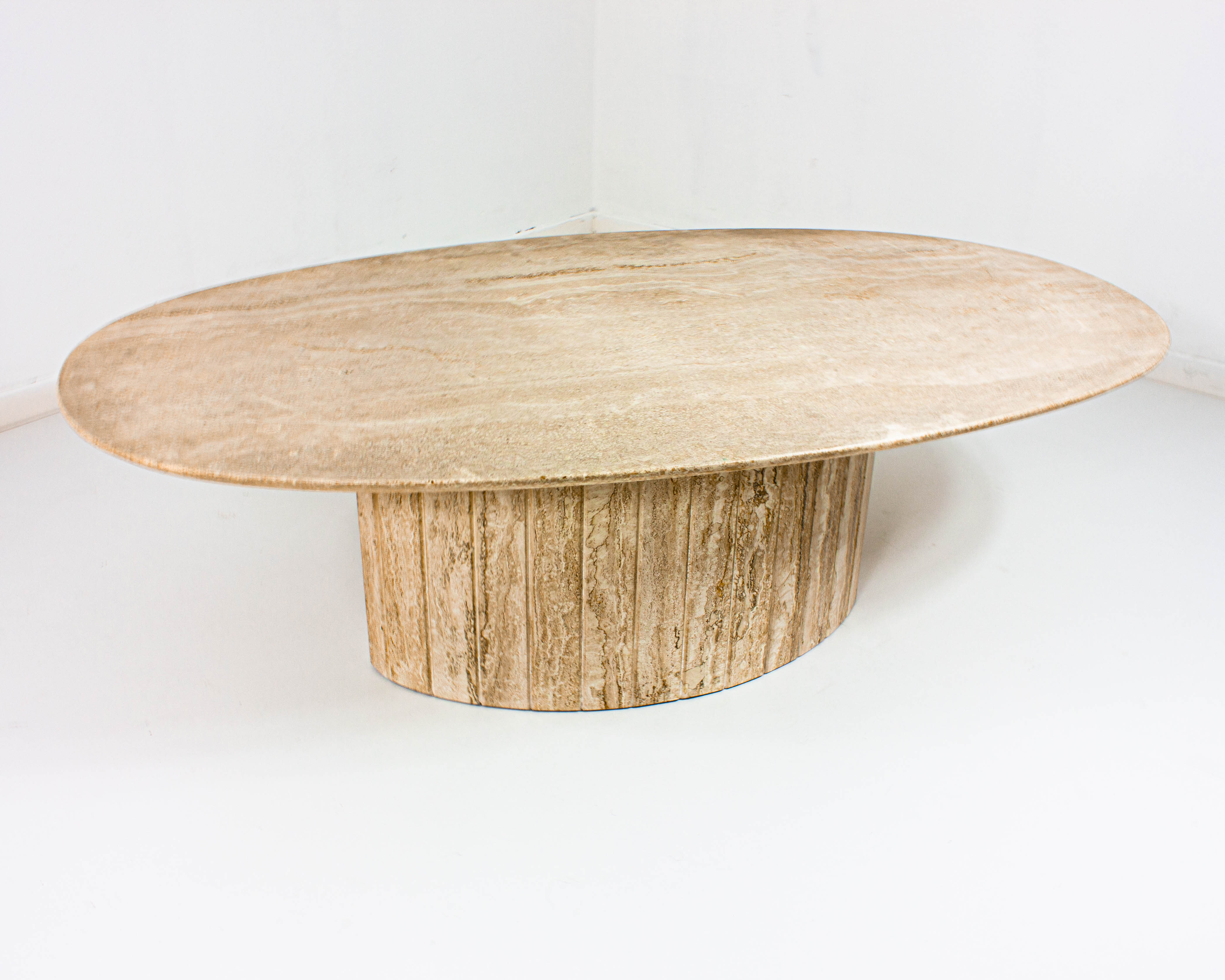 Oval Italian coffee table in travertin, 1970s